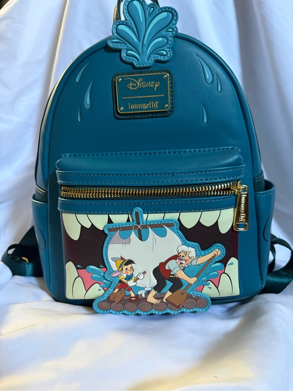 Loungefly Teal Pinocchio Mini Backpack with Gold Hardware